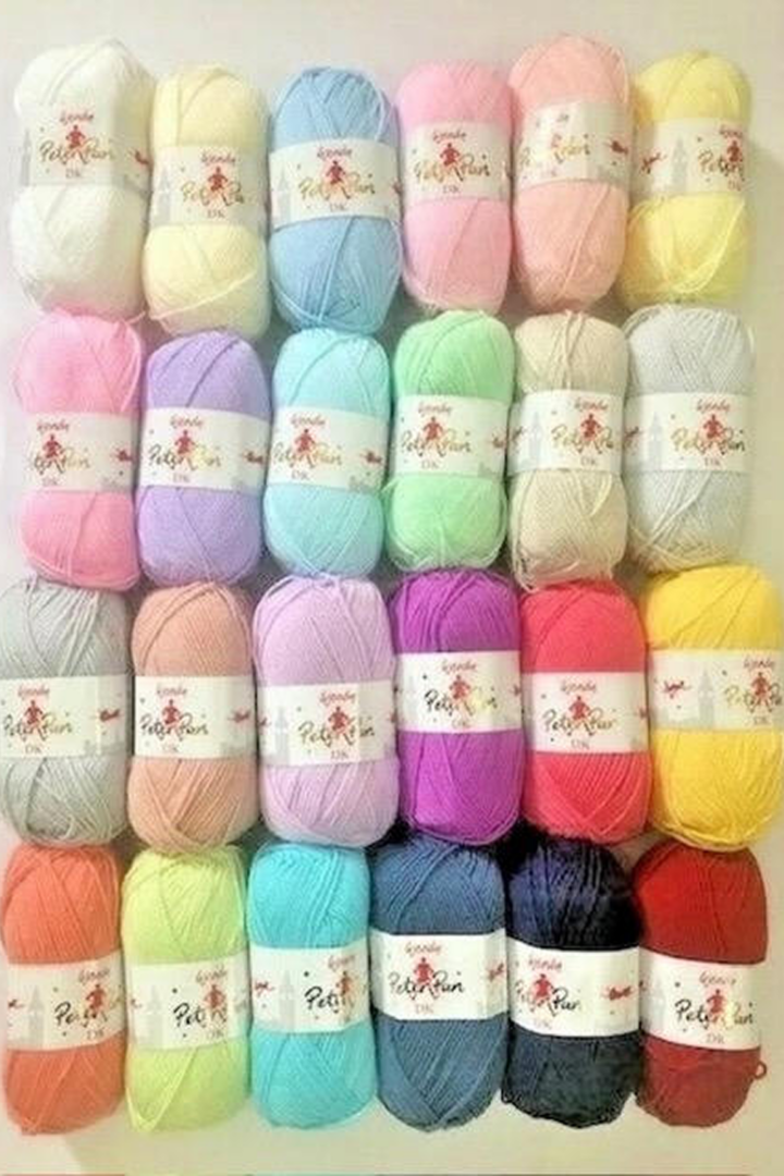 Colorful yarn skeins arranged in rows