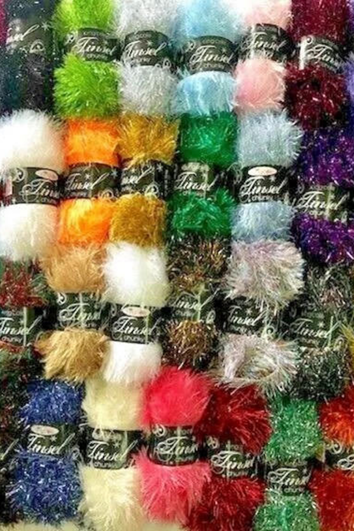 Assorted fluffy yarn skeins display