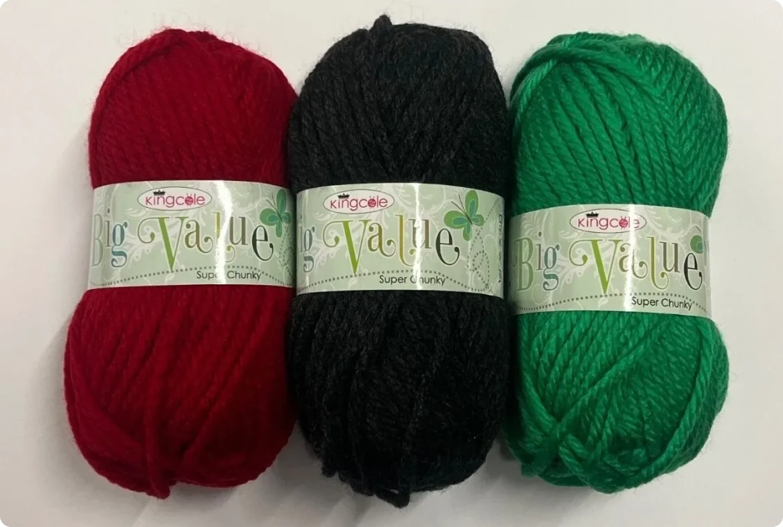 Three colorful yarn skeins